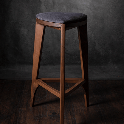 Terza Stoffa – Sgabello da bar in noce con seduta imbottita